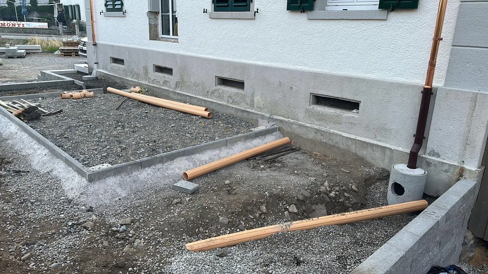 Gartenerneuerung mit Terassenbau & Carport