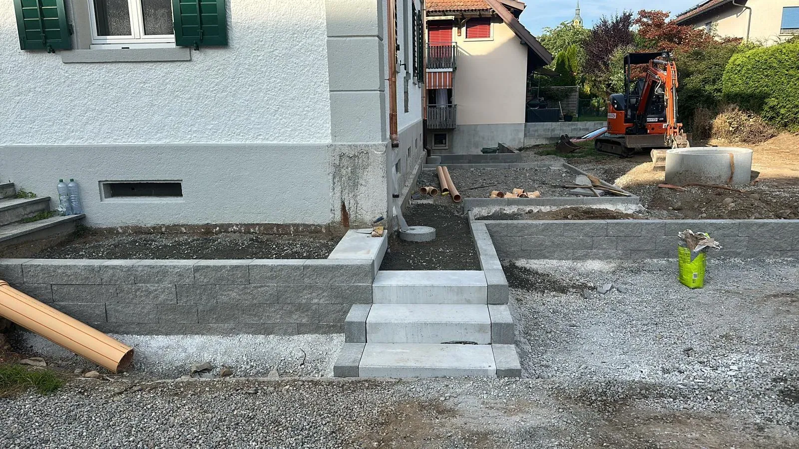 Gartenerneuerung mit Terassenbau & Carport